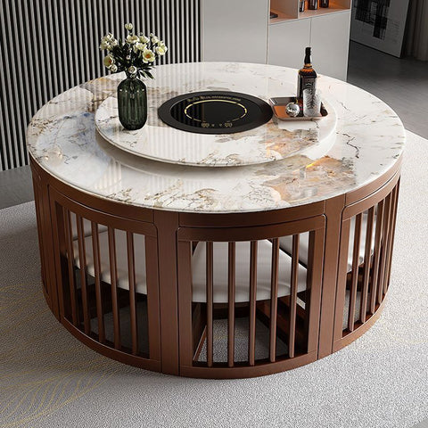 A luxurious round marble dining table with a wooden base, set for entertaining guests, showcasing elegance and modern functionality in home decor