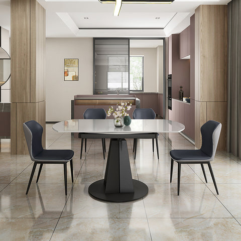 living room with placing white top sintered stone dining table and two black dining chairs