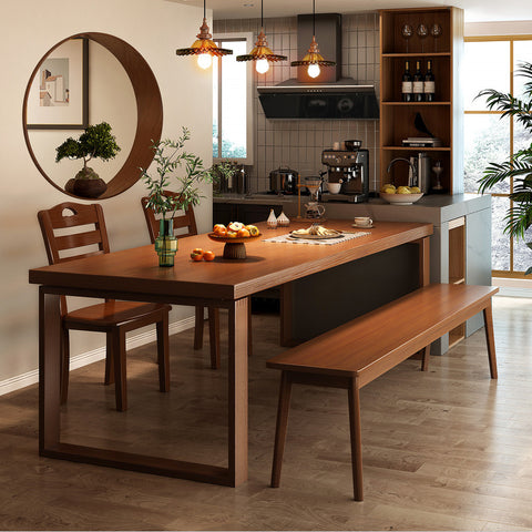Contemporary wooden dining table with matching bench in a modern kitchen, demonstrating the multifunctional use of space and furniture design