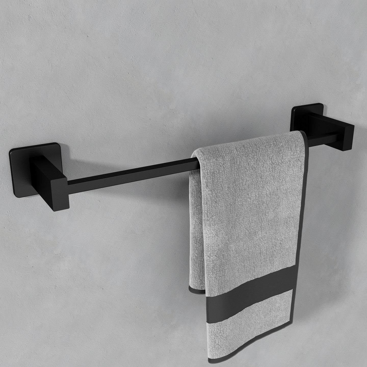 Elegant wall-mounted black towel bar with a plush grey towel, enhancing the functionality and style of a modern bathroom design