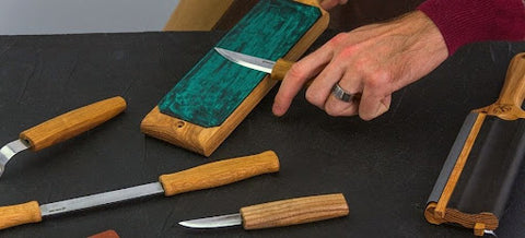 Knife sharpening with paddle strop