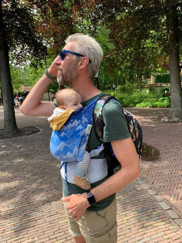 Dad using a baby carrier