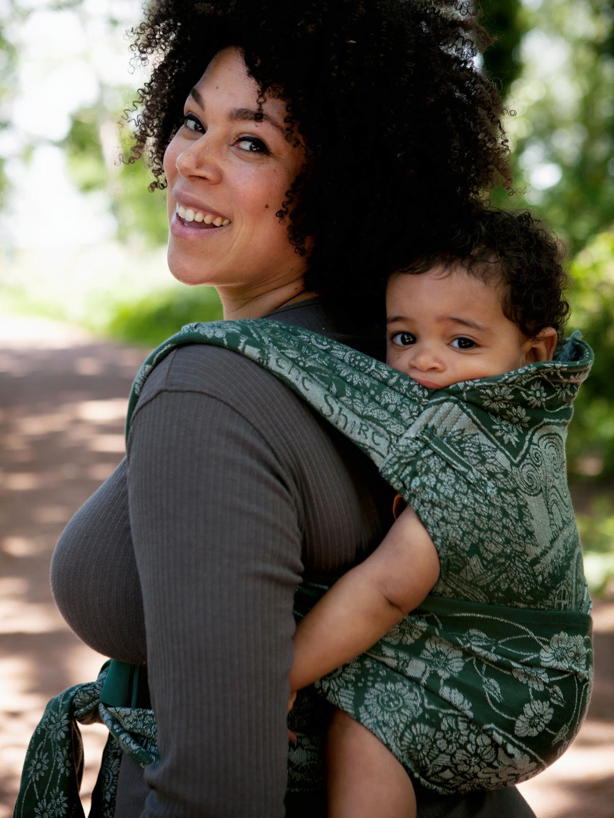 shire westfarthing baby cairis carrier in a back carry