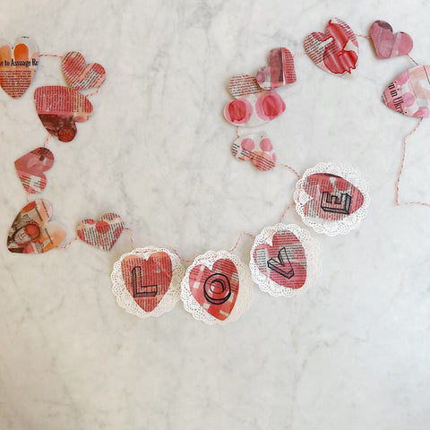 Finished Valentine's Day Garland using Do A Dot Art Markers! and other supplies