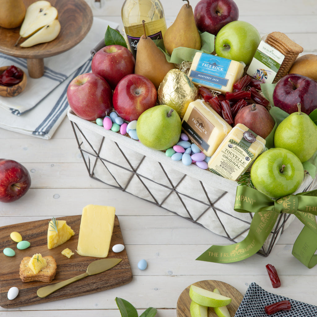 Large cloth & wire basket filled with 14 apples & pears 3 artisan fresh cheeses cider & 4 other treats