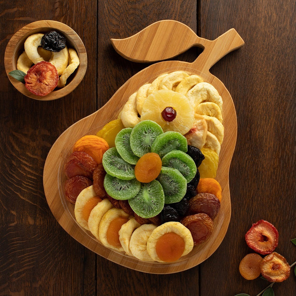 9 types of dried fruits arranged on an included pear-shaped bamboo tray