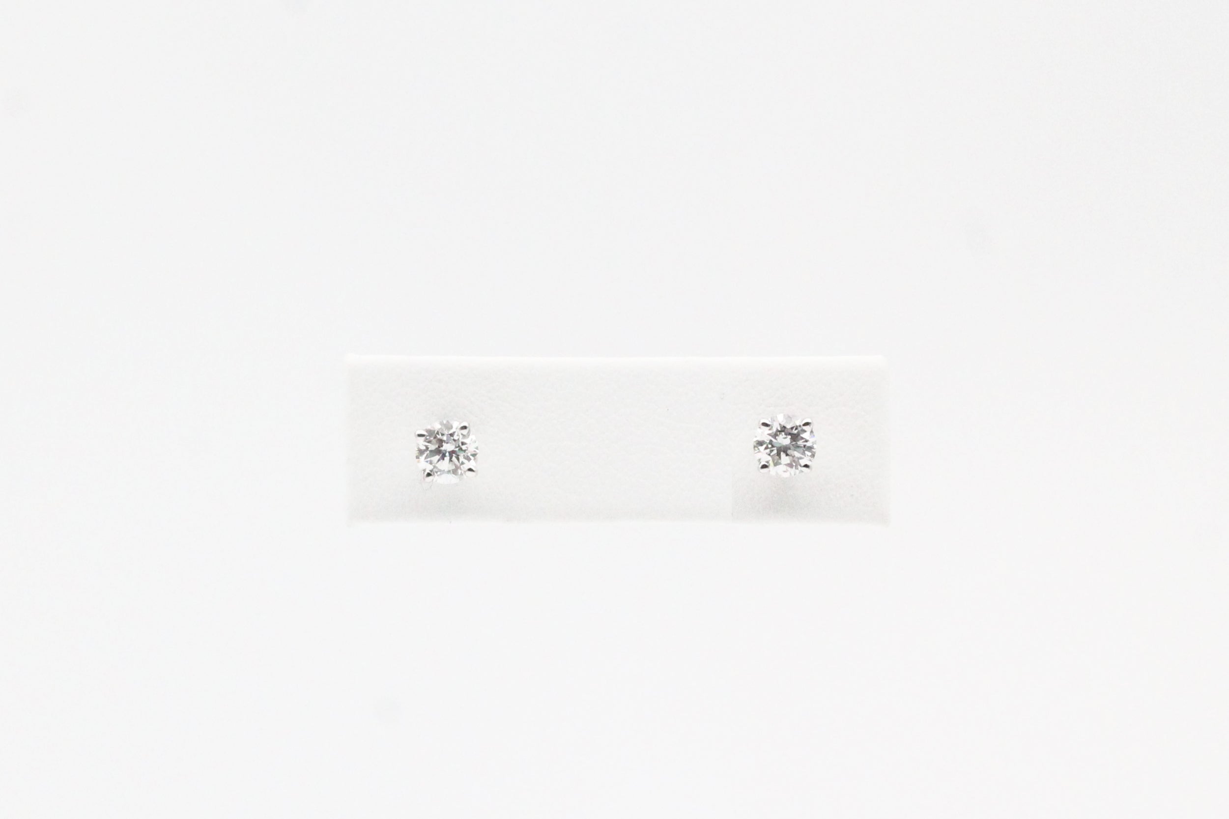 White Gold .84ctw Diamond Stud Earrings