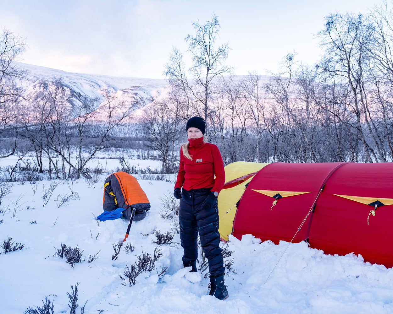 Underneath the wool fleece and down pants is Ruskovilla's outdoor layer and on top is a merino wool beanie.