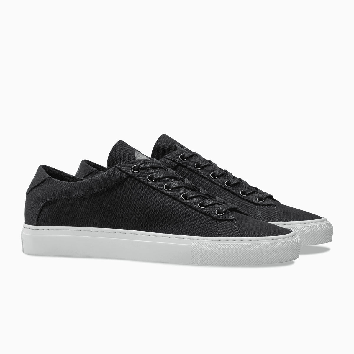 black low top leather sneakers