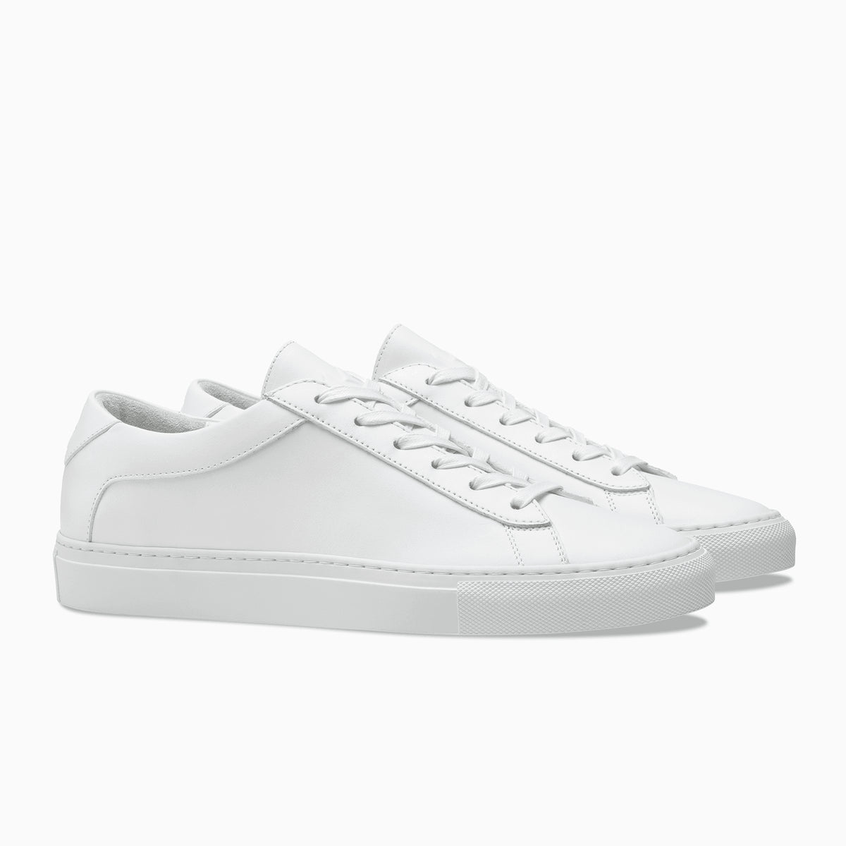 white leather plimsolls womens