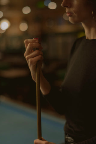 woman playing billiards dining pool table