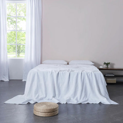 Optic White Linen Flat Sheet on Bed
