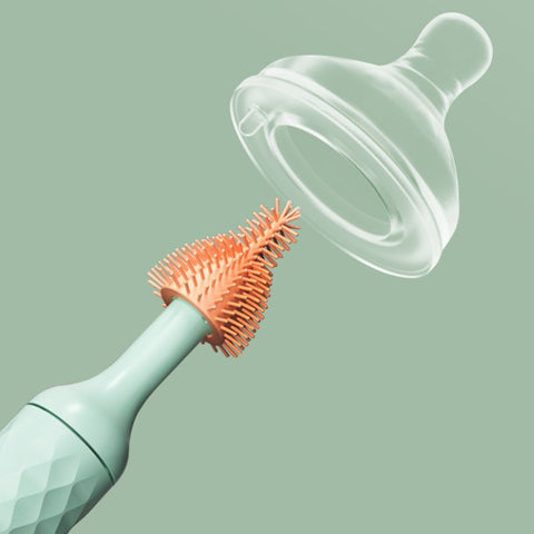 Brosse à biberon avec nettoyeur à tétine et support Vert