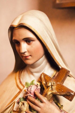 Virgin Mary Holding a Rose