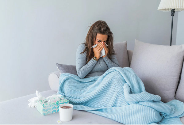 Bild einer Frau mit Erkältung
