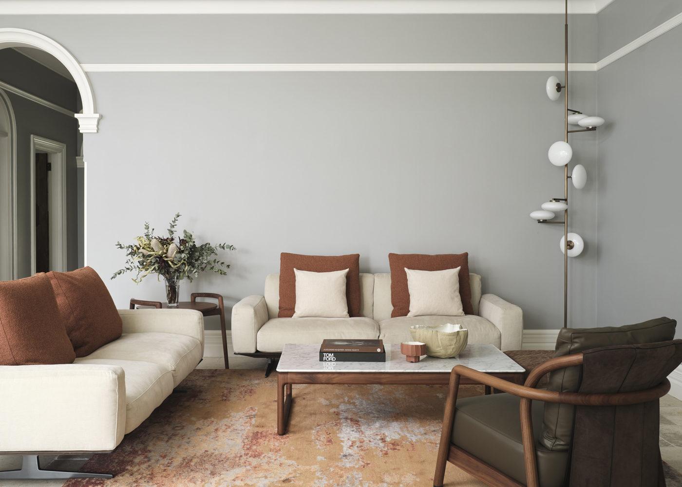 Pastel grey walls with brown and beige sofa and floor to ceiling designer floor lamp Singapore - MAMI' Small Floor-Ceiling Lamp’ by Penta