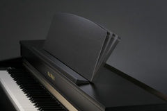 Giống như đàn piano lớn, góc nhìn của giá đỡ bản nhạc CN37 có thể được điều chỉnh để phù hợp với vị trí chơi của người biểu diễn hoặc đặt phẳng để tạo bề mặt bằng phẳng để ghi điểm.