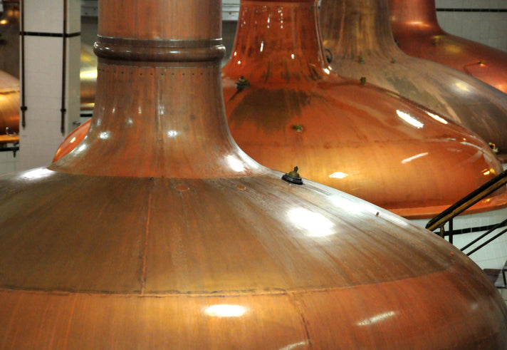 copper stills used to help in the process of making cachaça
