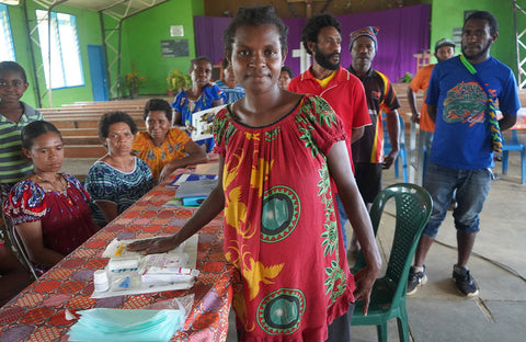 Vivienne explains the use of each item in the Delivery Kit to other volunteers attending the Village Health Assistants’ training' UNICEF PNG/Chambers/2023