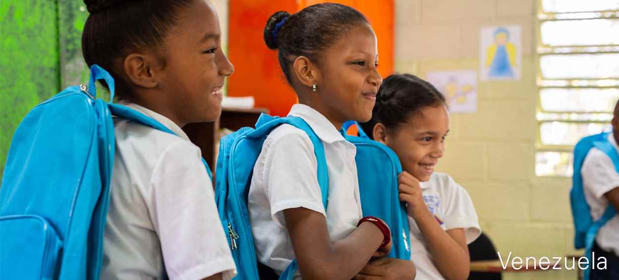 Girls with UNICEF provided school bags