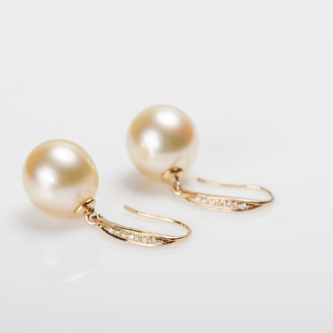 Valentine's Day jewelry gift idea pearl earrings with diamond-accented hoops