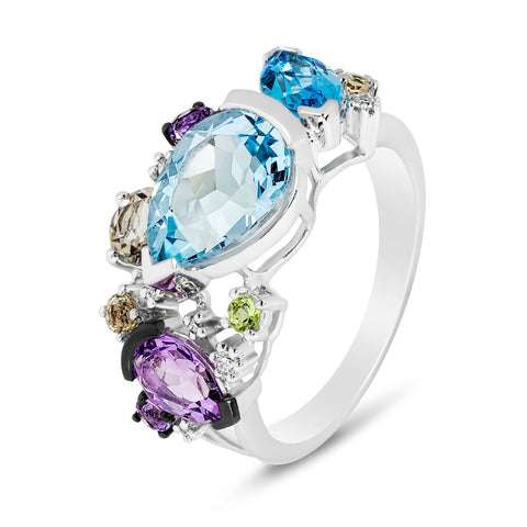 An unconventional custom design jewelry ring that features several different gemstones to help it stand out. 