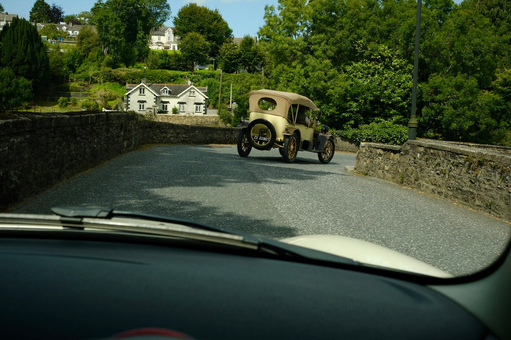 vintage car from 1914 on bridge into Inistioge County Kilkenny Ireland