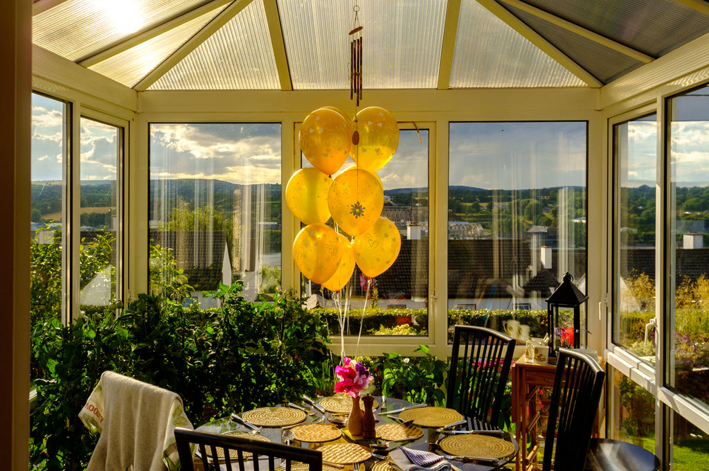 yellow balloons above dining table celebrating 50th wedding anniversary in New Ross County Wexford Ireland