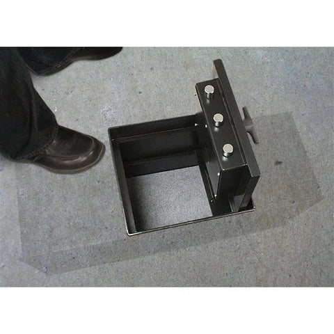 an in-floor safe installed in a concrete floor