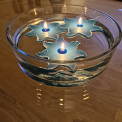 glittering floating candles made of rapeseed wax