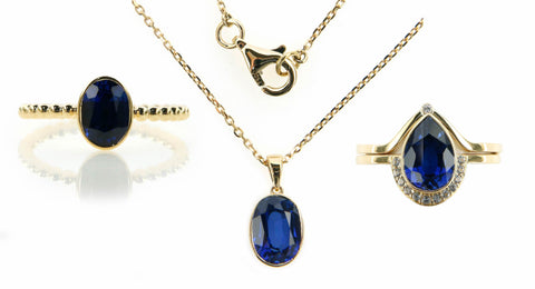 sapphire and recycled gold ring and necklace with pear shaped stone