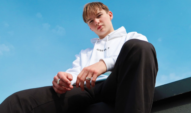 Male model wearing a white hoodie