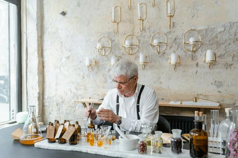 A man making perfume oils