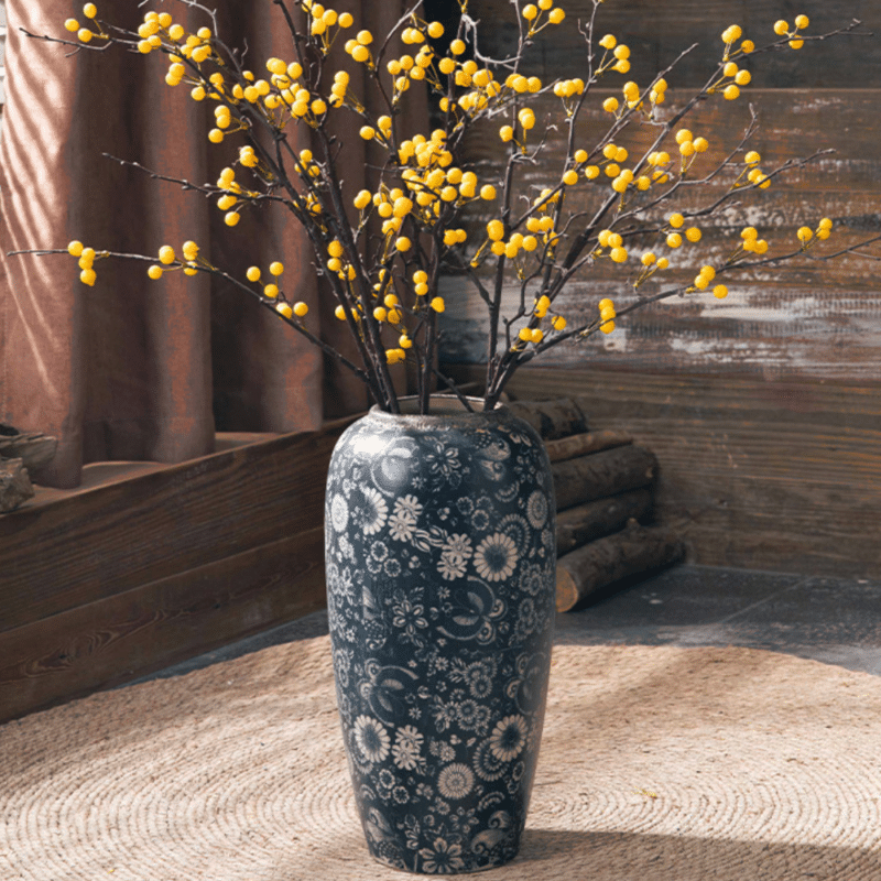 Blue floor vase with flowers