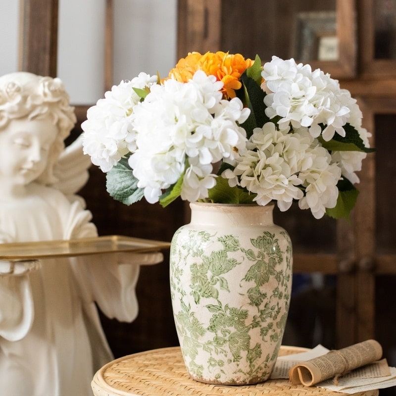 Cracked porcelain vase with floral pattern