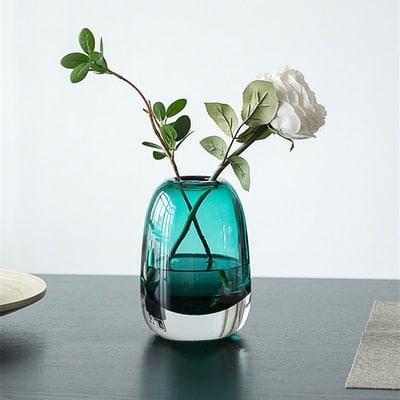 Round art deco vase in colored glass