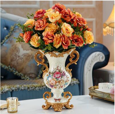 Vintage vase with gilding and floral pattern