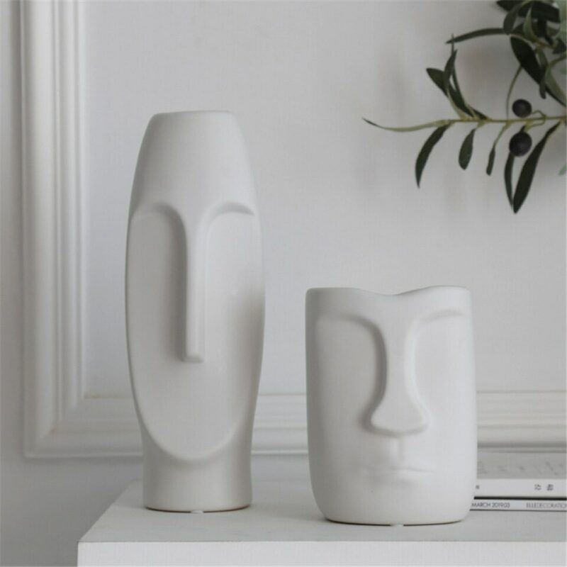 White head-shaped vase