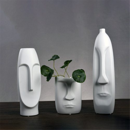 White head-shaped vase