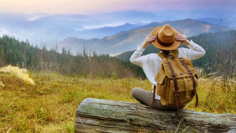 an woman is travelling