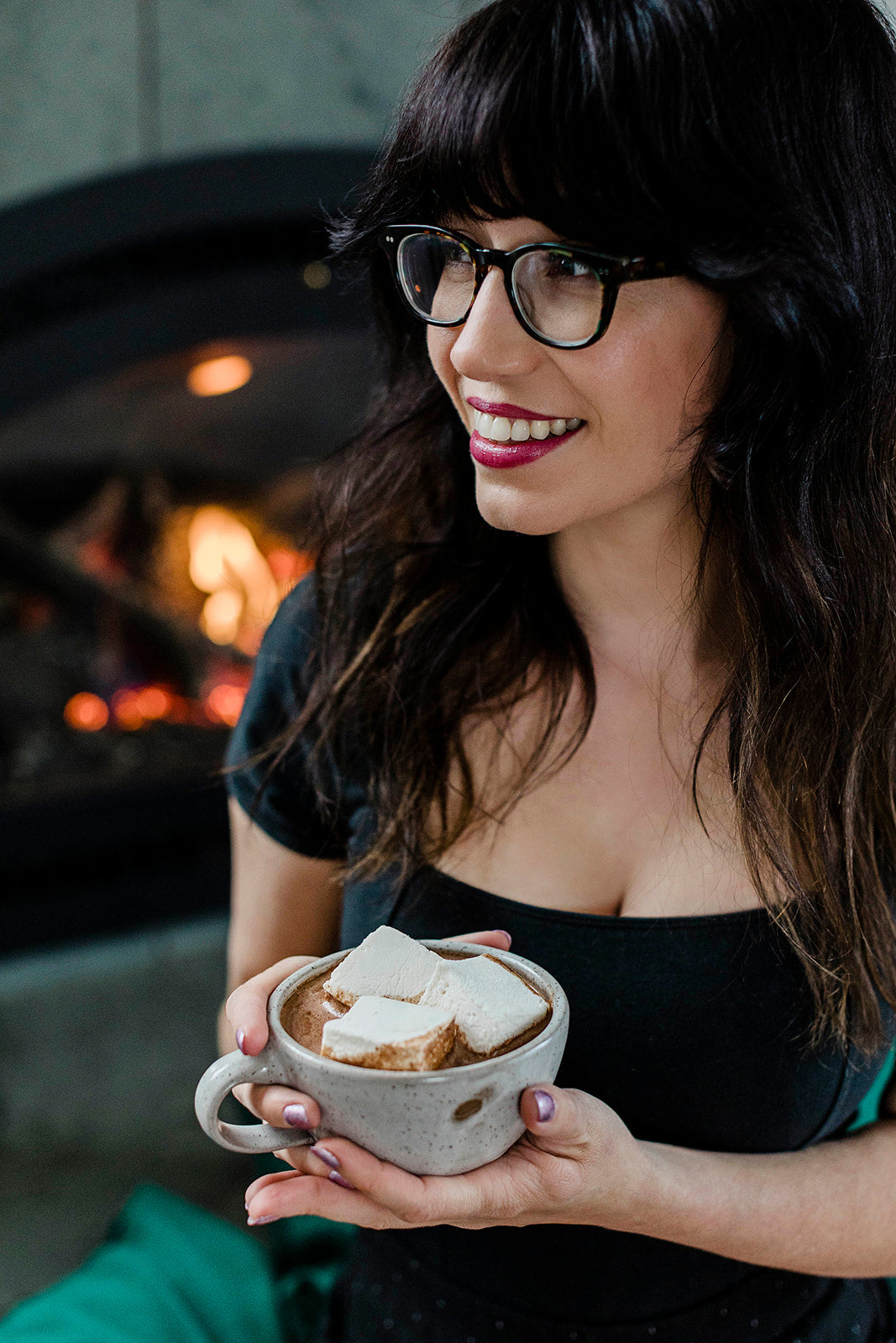 marshmallow news Girl holding cup of handcrafted marshmallows and cocoa