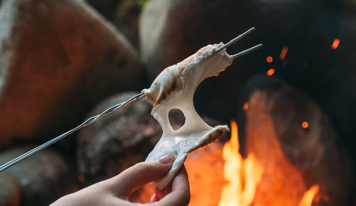 marshmallow news Handcrafted marshmallow toasting over a fire