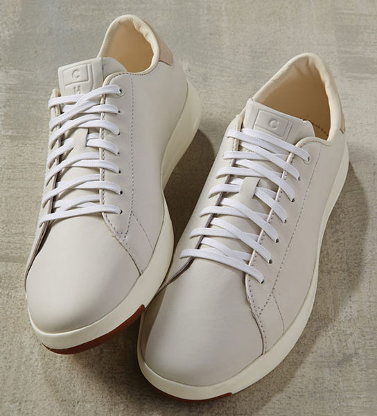 white tennis sneakers