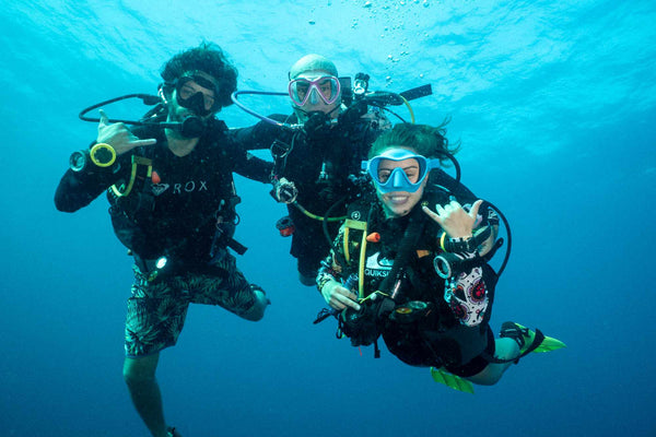 happy divers in Koh Tao, Thailand