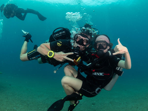 father and daughter enjoying their diving in Koh Tao. Thailand