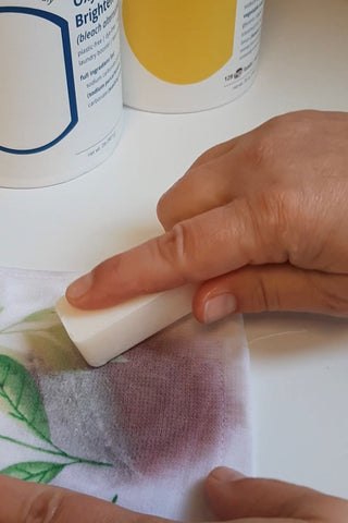 Rubbing Soap Stick on Red Wine Stained Napkin