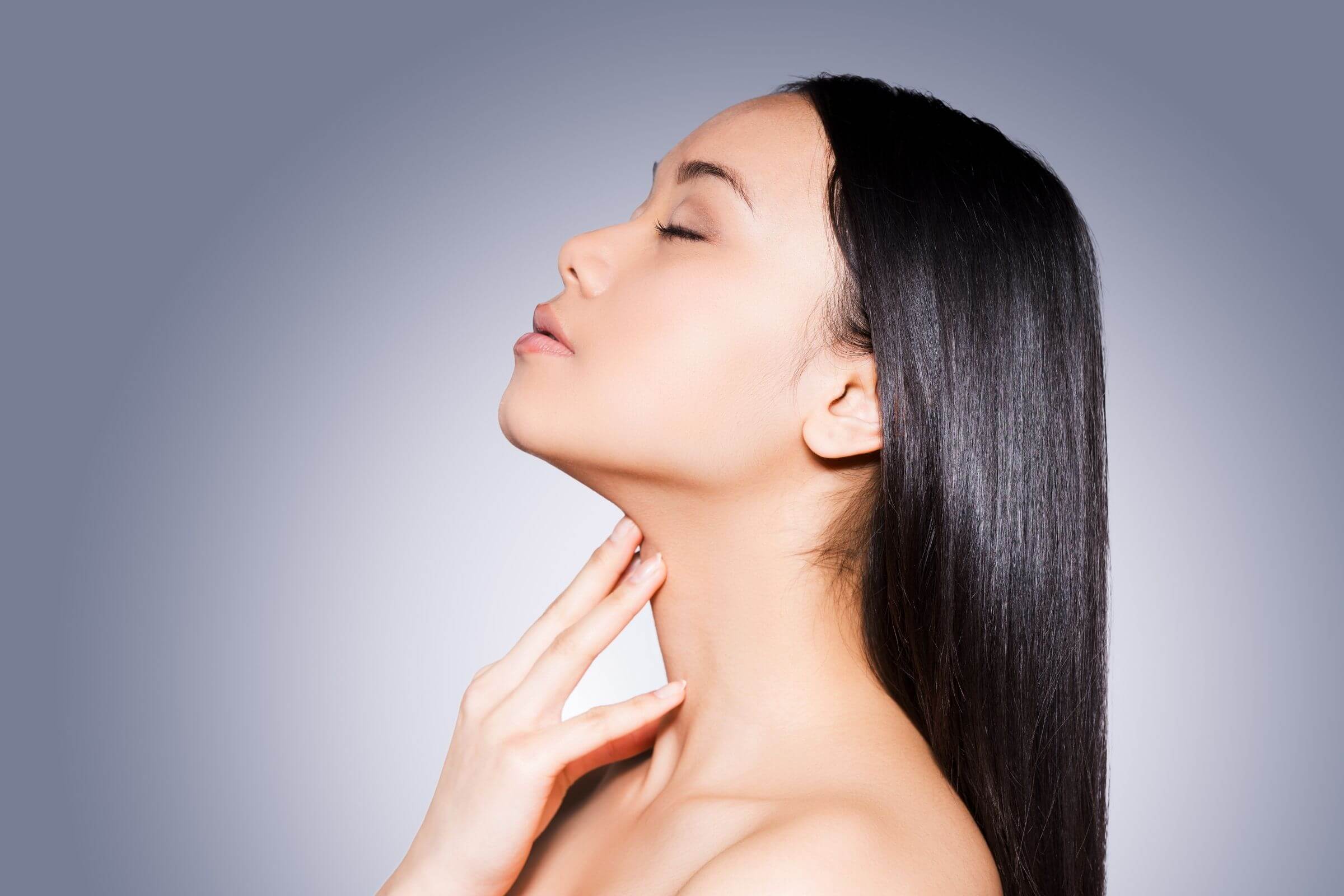 Model posing with shiny and healthy hair