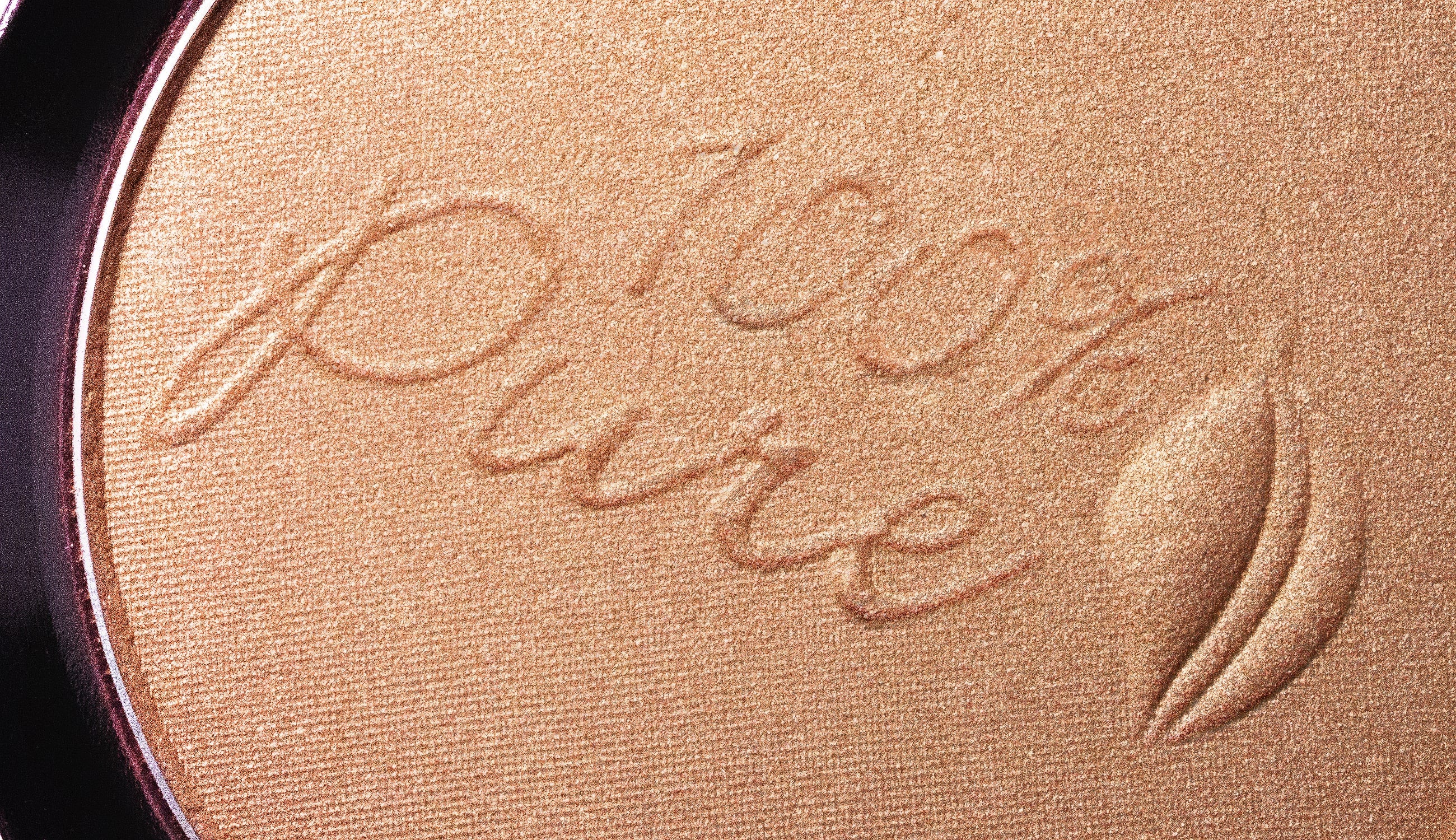 Rose gold luminizer closeup