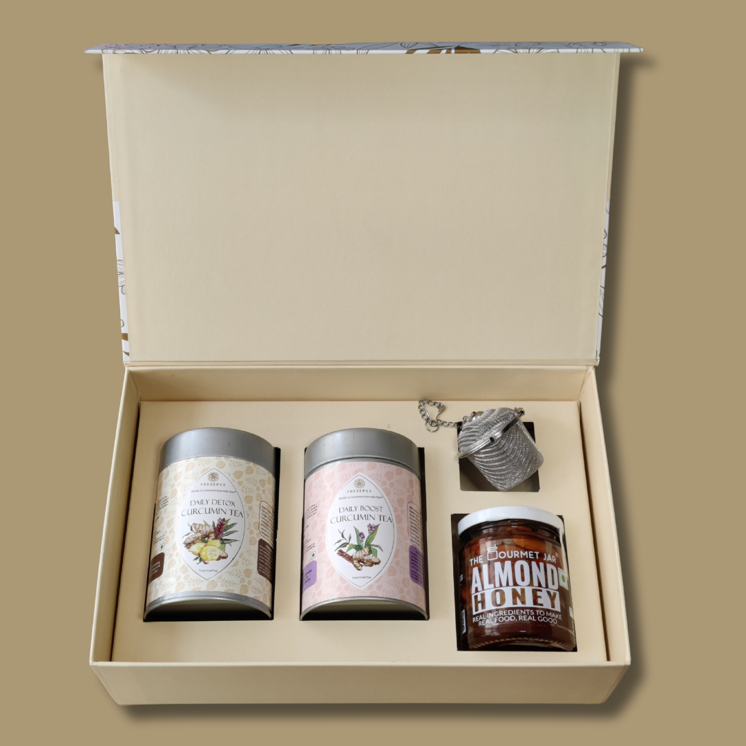 Brown Tea Gift Box with a honey & almond container and a chain tea infuser with two small herbal teas