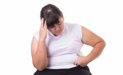 A stressed person due to obesity and overeating